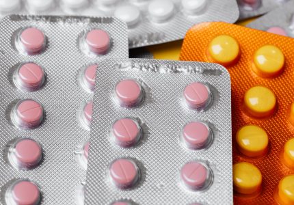 assorted pills in plastic blister packs