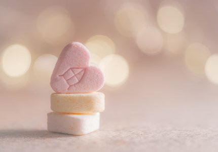 three beige yellow and pink heart marshmallows